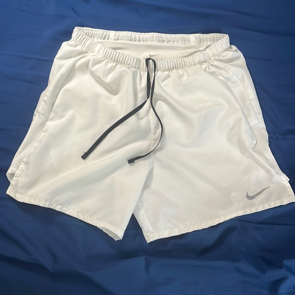 White Nike running short Size Small used.